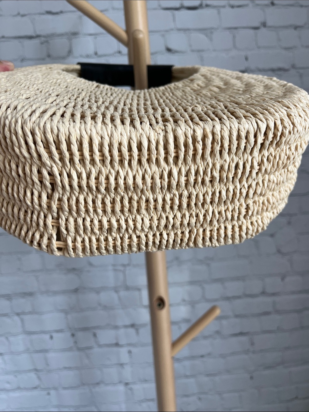 A New Day Round Woven Straw Bag with Black Handle - Picture 4 of 6